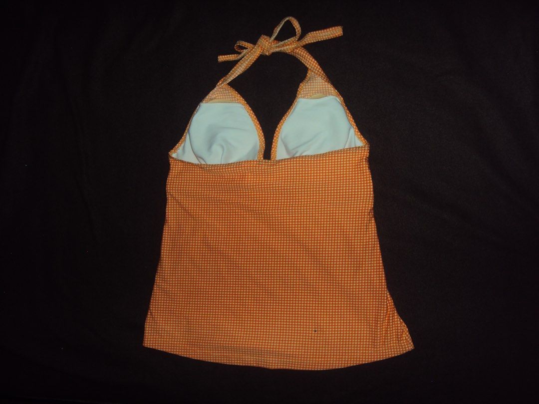 Orange Gingham Halter Tankini Top / Swim Top (Category: Sleeveless) located in Candon. Submitted by czaeya (Listing ID 1449008537, Image 3). Description: ♡ Color: Orange, Black ♡ Pattern: Gingham / Checkered ♡ Neckline: Halter neck / Plunging V-neck ♡ Details: Front sash tie, gathered bust, empire waist ♡ Style: Retro, Indie, Y2K, Summer Swimwear ♡ ask for more pics! this is one of my favorites, it makes your skin look glowy (:.