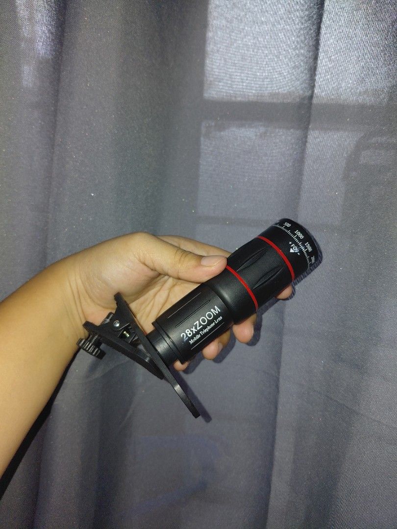 Phone Zoom Lense (Category: Lens & Kits) located in Quezon City. Submitted by loey_1485 (Listing ID 1449001606, Image 2). Description: Phone Zoom Lense - Used once (Kakabili lang po) - 28x zoom lense - With complete accessories.