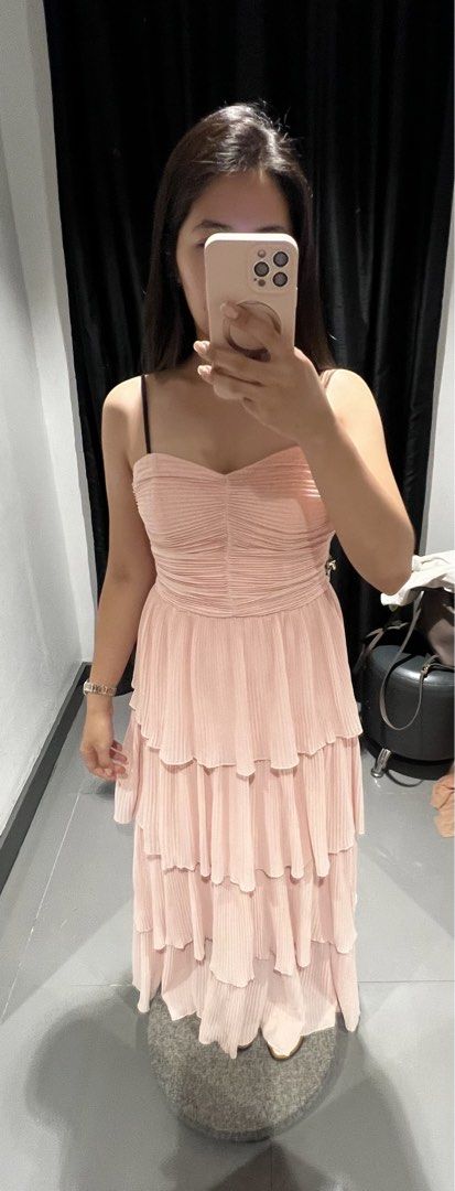 Pleated Peach Floor Length Dress (Category: Dresses) located in Bacoor. Submitted by thestufflab (Listing ID 1449102821, Image 1). Description: Brand: Viola Dress Bought from SM Department Store - MOA -with tag - with zipper at the back - with black ribbon accessories Display Photo Height 5’2 inches Amount : PHP 3,500.00 Never been used Meetup : SM Bacoor Delivery : J&T.
