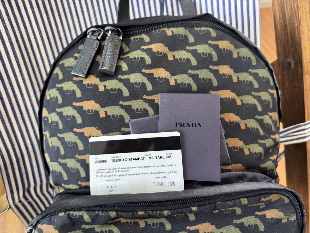 Prada backpack (Category: Luxury Bags & Wallets) located in Cagayan de Oro. Submitted by rjstz (Listing ID 1449071349, Image 2). Description: prada tessuto stampat militaire backpack made in italy in good condition slightly negotiable authentic!! with card .