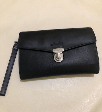 Prada Clutch Bag (Category: Bags & Wallets) located in Kuala Lumpur. Submitted by zahid1997 (Listing ID 1449099363, Image 1). Description: .