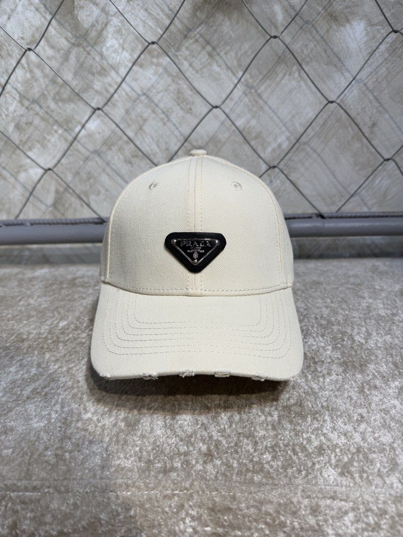 Prada Milano Baseball Cap Beige (Category: Caps & Hats) located in Manila. Submitted by ardobe.mnl (Listing ID 1448955069, Image 2). Description: Good asnew No issue.