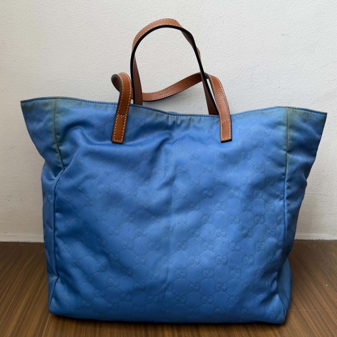 Pre Owned Authentic GUCCI GG Nylon Tote Bag (Category: Luxury Bags & Wallets) located in Paranaque City. Submitted by Glamfahd (Listing ID 1448948052, Image 3). Description: Pre Owned Authentic GUCCI Bag Inclusion/s: None Condition Well Used condition Marks on exterior Marks on interior Bag is really a great buy! Please manage your expectations as you are buying an authentic second hand item at a fraction of the cost.