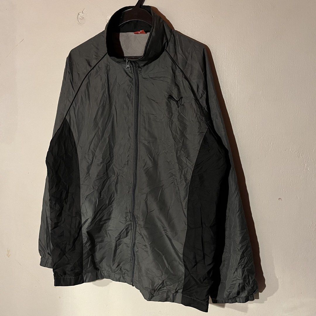 Puma | Gray Windbreaker with Black Stripes (Category: Coats, Jackets and Outerwear) located in Quezon City. Submitted by giometryyy (Listing ID 1449102671, Image 3). Description: W23 L28 Large excellent condition embroidered logo with two side pockets 📍Fairview, QC 🛵Lalamove/J&T payment first .