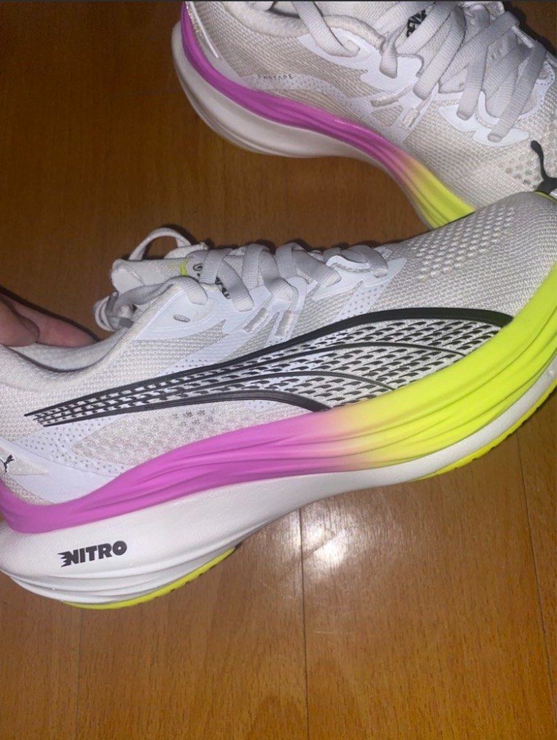 Puma Deviate NITRO 3 Wns Running Shoes White Magenta (Category: Sneakers) located in Manila. Submitted by _andireya (Listing ID 1448950266, Image 2). Description: - Puma running shoes - Color: White with pink and neon yellow accents - Features: NITRO foam for enhanced cushioning - Size: US Women's 6 - Condition: Recently purchased - Ideal for: Running.