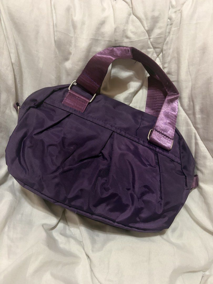 Purple Nylon Shoulder Bag with Top Handles (Category: Luxury Bags & Wallets) located in Malabon City. Submitted by pbjsandowichi (Listing ID 1448926082, Image 2). Description: Mod: J&T, Lalamove Mop: Gcash, Gotyme, Maribank delivery fee will be shouldered by the buyer .