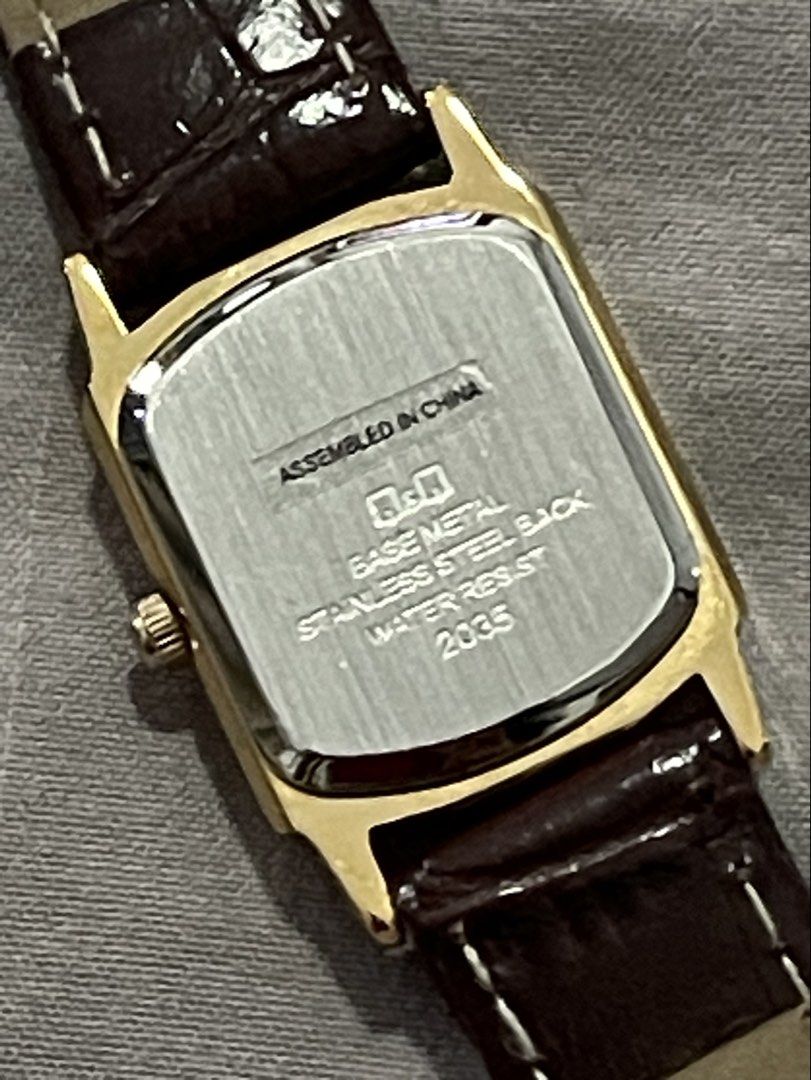 Q&Q Rectangular Gold Tone Watch Brown Leather Strap Water Resist (Category: Women's Watches) located in Caloocan City. Submitted by veryred (Listing ID 1440463788, Image 3). Description: - Gold tone rectangular watch - Cream dial with Arabic numerals - Brown leather strap - Water resistant - Assembled in China - Made with base metal and stainless steel back - Ideal for everyday wear.