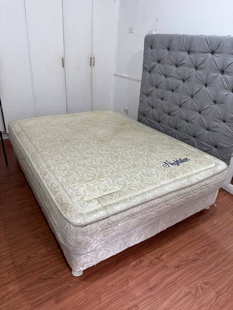 Queen Size Bed Set with Mattress, Divan Base (Category: Bed Frames & Mattresses) located in Pasig City. Submitted by rctaneo24 (Listing ID 1449026261, Image 1). Description: Queen-size bed set for sale, including mattress, upholstered divan base. Sturdy and comfortable, ideal for a master bedroom, condo, rental unit, or guest room. Well used with visible signs of wear and discoloration; please check all photos. Cleaning is recommended. Buyer to a