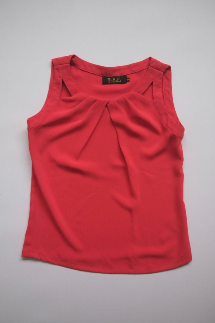 R.A.F. Red Sleeveless Top (Category: Sleeveless) located in Naga. Submitted by billysstuff (Listing ID 1448995891, Image 1). Description: - Sleeveless top from R.A.F. Rich and Famous - Features a gathered detail at the front neckline - Simple and chic design - Perfect for dressing up or down.