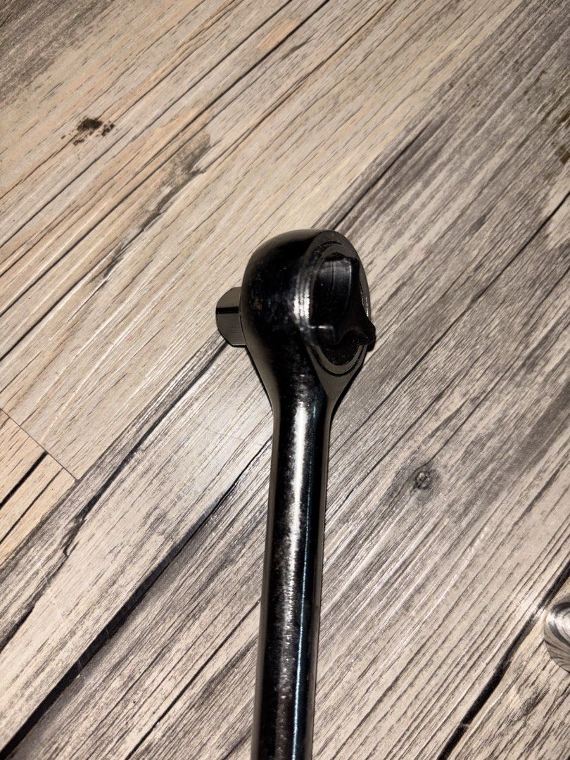 Ratchet Wrench with Socket Adapter (Category: Construction Tools & Equipment) located in Paranaque City. Submitted by riapgn_ (Listing ID 1449042155, Image 2). Description: - Ratchet wrench with knurled handle for enhanced grip. - Comes with a socket adapter. - Shows some signs of use but is fully functional. - Ideal for general repairs and DIY projects. - Ready for its next task. - Ratchet is 3/8 and a reducer to 1/4.