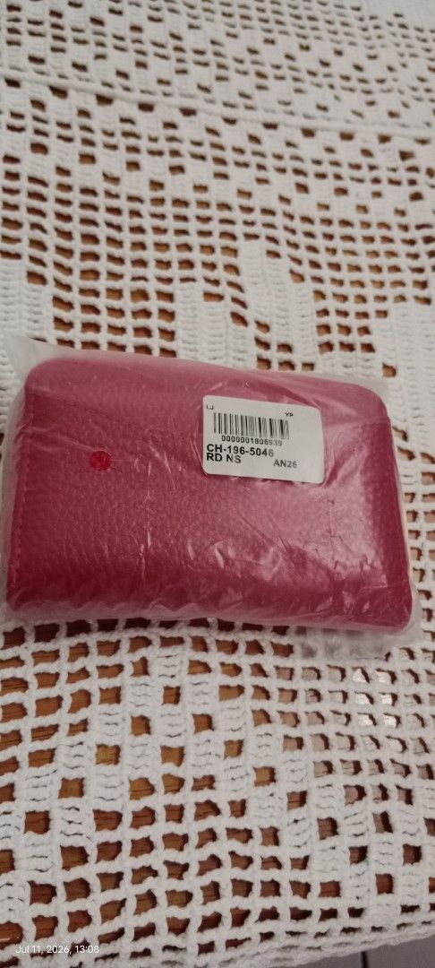 Red Leather Zipper Card Holder Wallet (Category: Wallets & Card holders) located in Makati City. Submitted by underthetuscansun (Listing ID 1448957463, Image 2). Description: - Genuine red leather card holder - Secure zipper closure - Multiple slots for ample card storage - Compact design, perfect for pockets or small bags - Elegant gold zipper accent - Ideal for organizing your daily essentials.