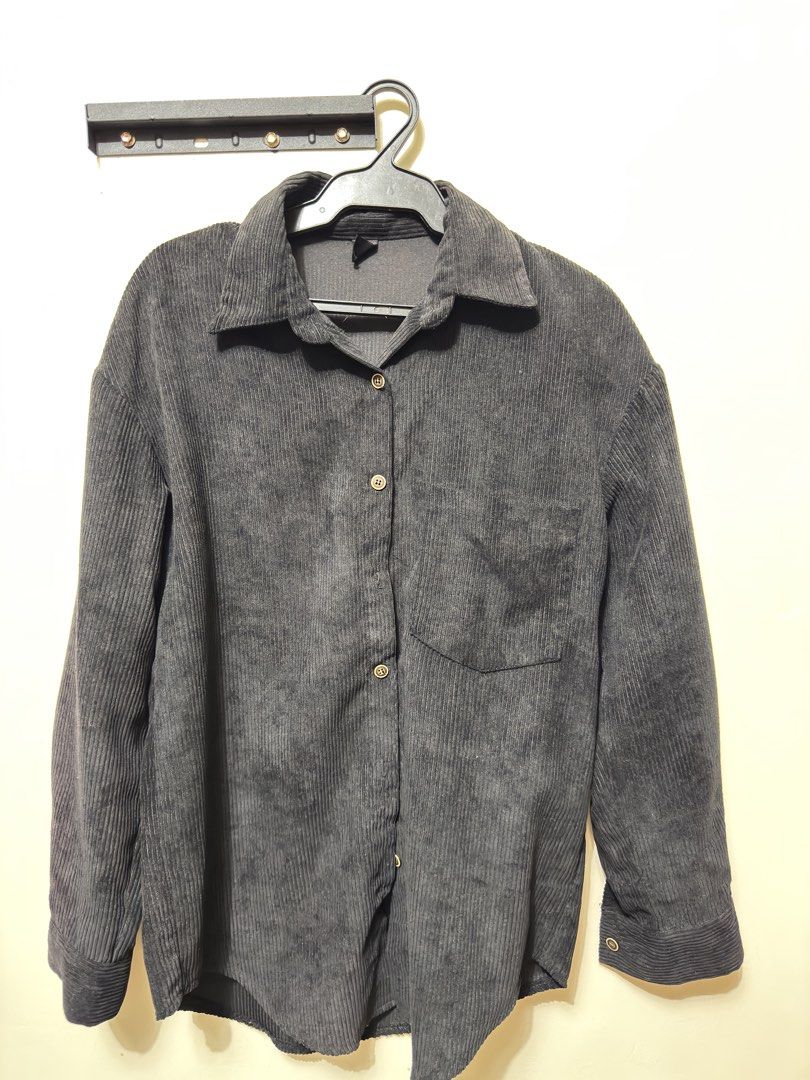 SHEIN Corduroy Button-Up Shirt (Category: Tshirts & Polo Shirts ) located in Quezon City. Submitted by weeklydeclutter (Listing ID 1449056534, Image 1). Description: - Dark grey corduroy shirt from SHEIN - Long sleeves with button cuffs - Single chest pocket - Button-up front - Relaxed fit - Ideal for layering or wearing solo l- 26.5 w-20.5.