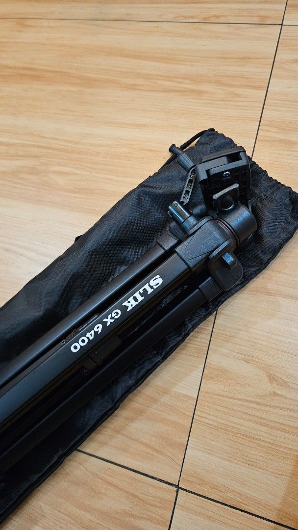 SLIK GX 6400 Digital Tripod with Bag (Category: Tripods & Monopods) located in Alfonso. Submitted by jbcamet (Listing ID 1449072607, Image 3). Description: - SLIK GX 6400 tripod - Includes original carrying bag - Ensures stable shots for your photos - Compact design for easy transport - Perfect for your next photography trip.