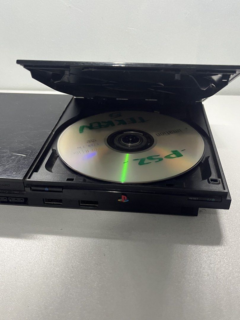 Sony PlayStation 2 PS2 Console - Black (Category: PlayStation) located in Bulacan. Submitted by zkayden (Listing ID 1448900034, Image 2). Description: Selling a black Sony PlayStation 2 console. It's the slim model. Some scratches on the top surface from normal use. Includes the console and one game disc. Great for retro gaming. MOD: J&T, Lalamove, LBC 🚚 Shipping fee is shouldered by the buyer. MOP: MariBank & GCash 💳 Payment first. Orders will