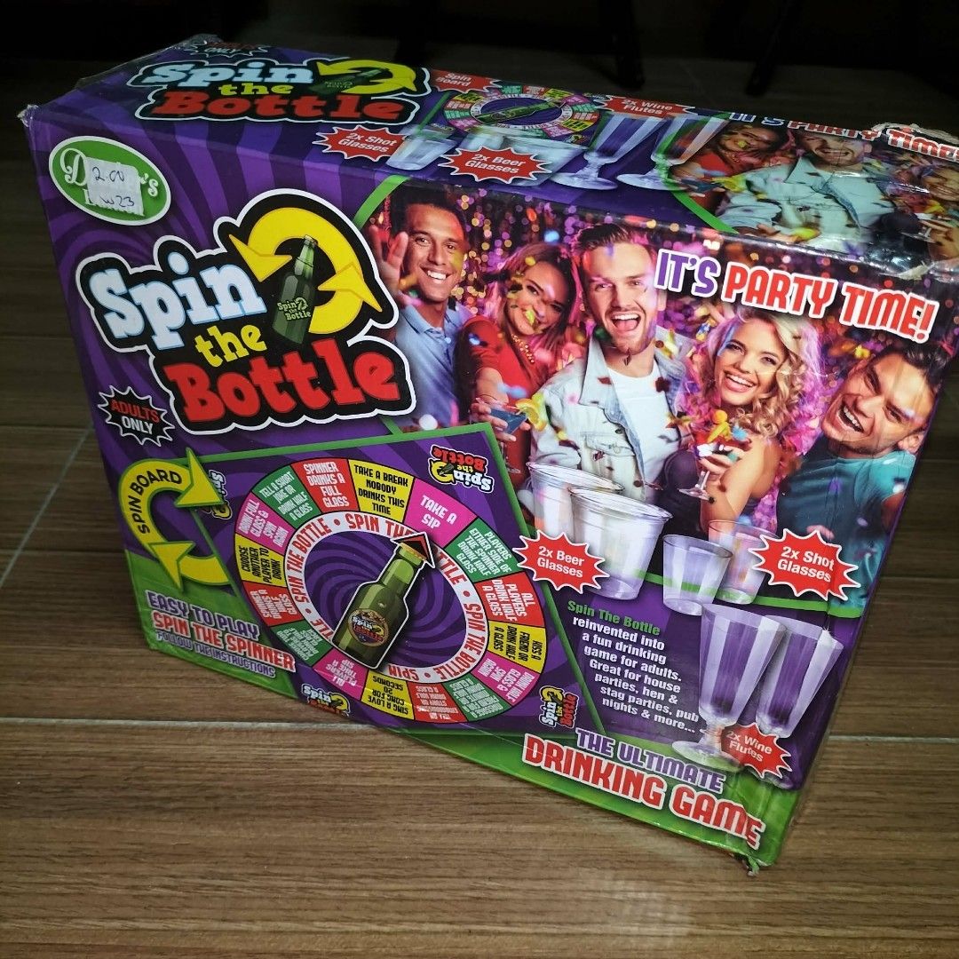 Spin the Bottle Drinking Game (Category: Board Games & Puzzles) located in Manila. Submitted by retsuya4 (Listing ID 1448907621, Image 1). Description: - The ultimate drinking game, reinvented! - Perfect for adult fun at house parties, hen & stag parties, pub nights, and more. - Easy to play: just spin the spinner! - Includes 2 beer glasses and 2 shot glasses. - Wine glasses not included..