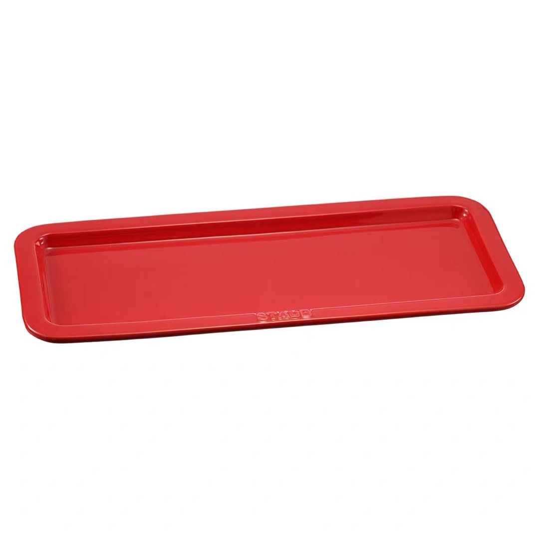 Staub Ceramic Rectangular Serving Tray Red (Category: Other Kitchenware & Tableware) located in Klang. Submitted by jwaloha (Listing ID 1449097785, Image 1). Description: - price excluding postage. - Staub ceramic rectangular tray - Color: Cherry Red - Includes original box - Dimensions: 36c14x2cm - Perfect for gatherings or home dining.