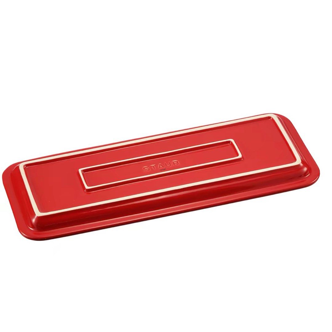 Staub Ceramic Rectangular Serving Tray Red (Category: Other Kitchenware & Tableware) located in Klang. Submitted by jwaloha (Listing ID 1449097785, Image 2). Description: - price excluding postage. - Staub ceramic rectangular tray - Color: Cherry Red - Includes original box - Dimensions: 36c14x2cm - Perfect for gatherings or home dining.