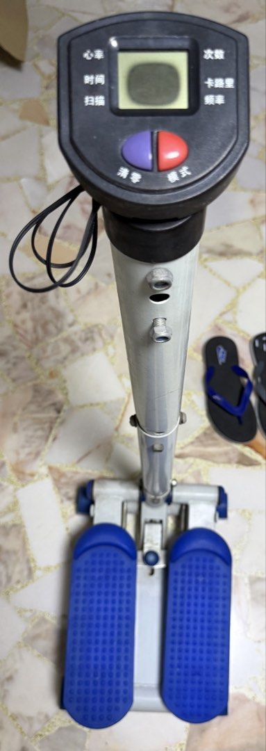 Stepper Machine (Category: Cardio & Fitness Machines) located in Singapore. Submitted by melodydance (Listing ID 1449092115, Image 2). Description: - Compact stepper for home workouts - Digital display is spoilt - Blue pedals with good grip - Ideal for quick cardio sessions - Space-saving design.