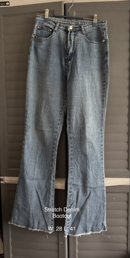 Stretch Denim Bootcut Jeans W: 28 L: 41 (Category: Jeans) located in Manila. Submitted by luisascloset_ (Listing ID 1448972447, Image 1). Description: - Light wash stretch denim - Bootcut style - Raw hem detail - Comfortable and stretchy material - Waist size: 28 - Length: 41 - Ideal for casual wear.