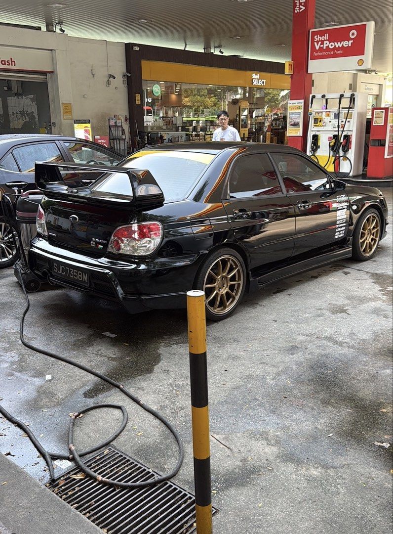 Subaru Impreza Impreza 4AT Auto (Category: Used Cars) located in Singapore. Submitted by the_don_king (Listing ID 1448957290, Image 2). Description: Black Subaru Impreza WRX STI. Gold rims. Sporty spoiler. Looks aggressive. Great for enthusiasts. Well maintained. Ready for a new owner. Contact me for more details. COE left 1 year 6 months.