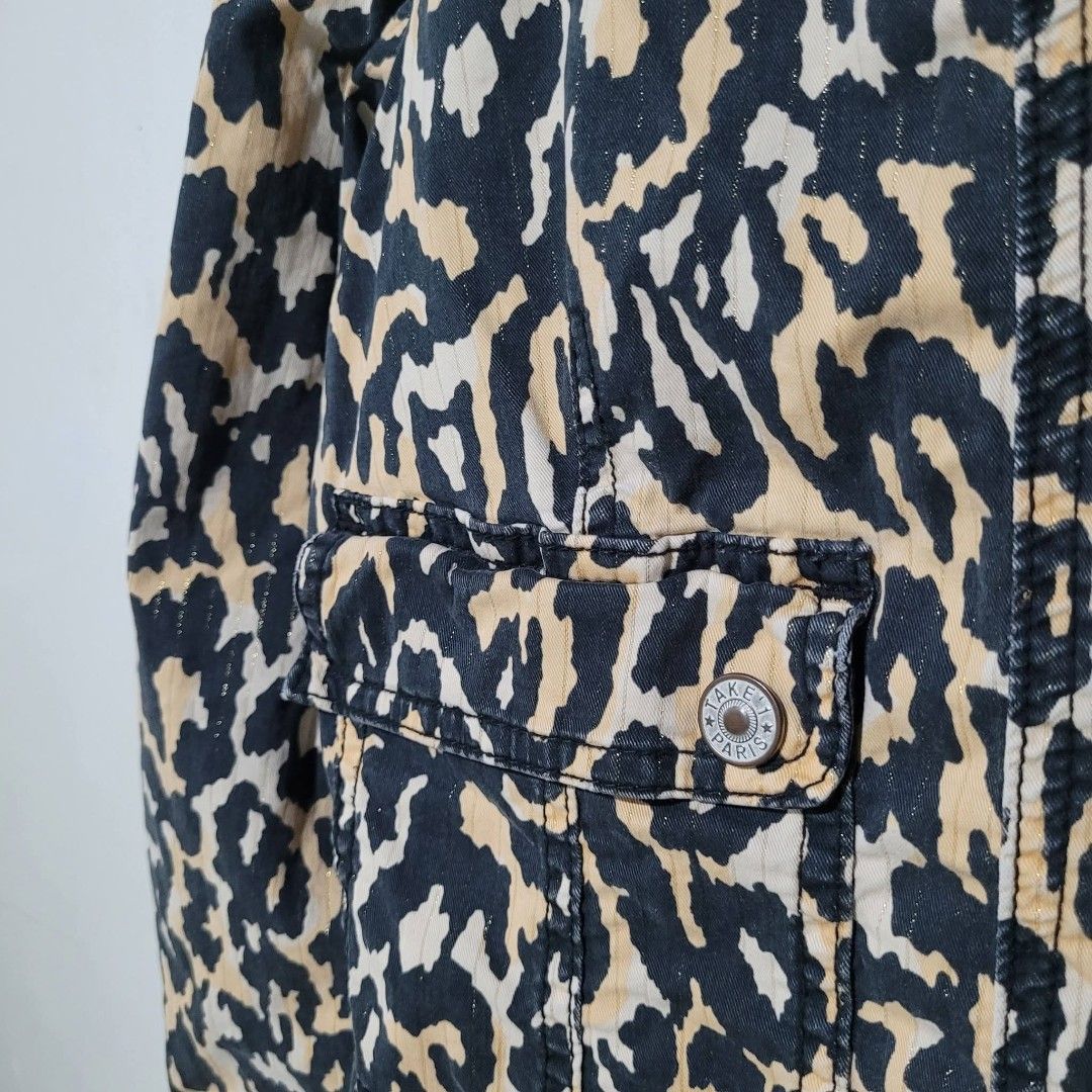 TAKE 1 Paris Leopard Print Denim Jacket (Category: Coats, Jackets and Outerwear) located in Quezon City. Submitted by eivan____orong (Listing ID 1449027683, Image 3). Description: Animal Print Jacket (21L x 17.5W) - Small to Medium Fittings - Leopard print design - Two chest pockets - Two side pockets - Button closure - Collar - Brand tag visible - Perfect for a bold look.