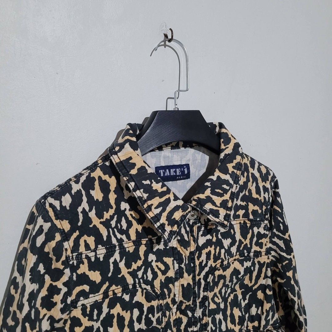 TAKE 1 Paris Leopard Print Denim Jacket (Category: Coats, Jackets and Outerwear) located in Quezon City. Submitted by eivan____orong (Listing ID 1449027683, Image 2). Description: Animal Print Jacket (21L x 17.5W) - Small to Medium Fittings - Leopard print design - Two chest pockets - Two side pockets - Button closure - Collar - Brand tag visible - Perfect for a bold look.