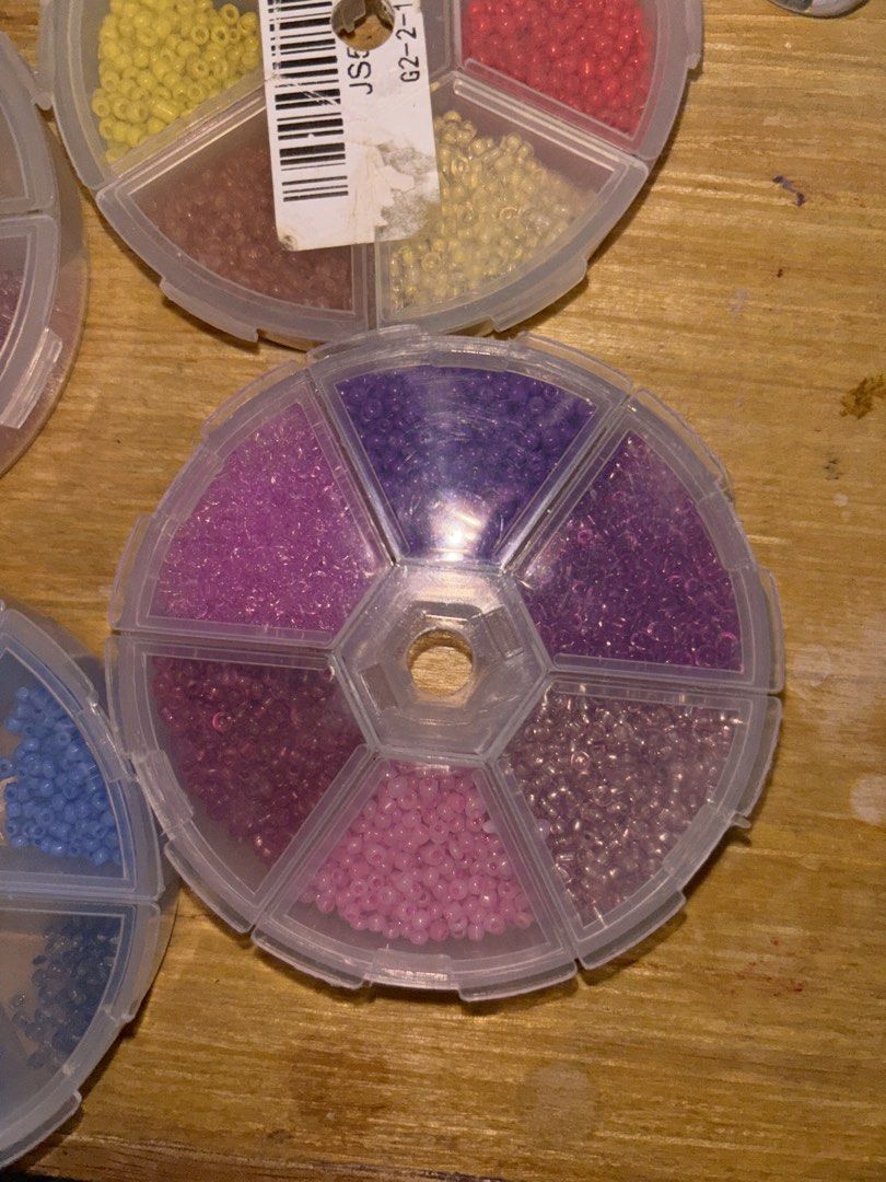 TAKE ALL Small Beads (Category: Craft Supplies & Tools) located in Manila. Submitted by meliorashop22 (Listing ID 1449013761, Image 2). Description: - Vibrant Color Palettes: Features four separate theme-organized wheels, including blues, purples/pinks, greens/teals, and warm yellows/reds. - Pre-sorted & Organized: Comes in clear, rotating multi-compartment wheels that keep different colors neatly separated and easy to access while crafting. - Ve