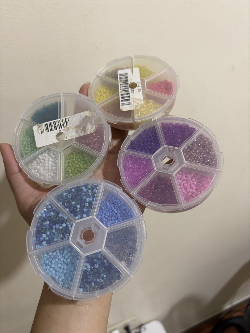 TAKE ALL Small Beads (Category: Craft Supplies & Tools) located in Manila. Submitted by meliorashop22 (Listing ID 1449013761, Image 1). Description: - Vibrant Color Palettes: Features four separate theme-organized wheels, including blues, purples/pinks, greens/teals, and warm yellows/reds. - Pre-sorted & Organized: Comes in clear, rotating multi-compartment wheels that keep different colors neatly separated and easy to access while crafting. - Ve