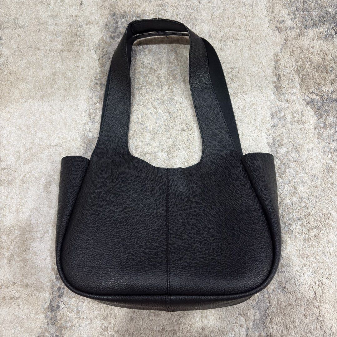 TASE Lea Tote Bag Mini Shoulder Bag (Category: Tote Bags) located in Santa Rosa. Submitted by kvbmm (Listing ID 1449041962, Image 1). Description: - Black TASE Lea Tote Bag Mini - Pebbled leather texture - Versatile: can be worn as a shoulder bag - Spacious interior, perfect for everyday essentials - Comes with original dust bag.