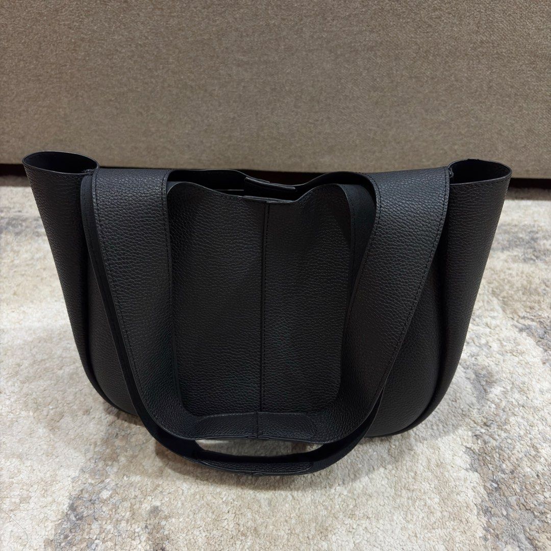 TASE Lea Tote Bag Mini Shoulder Bag (Category: Tote Bags) located in Santa Rosa. Submitted by kvbmm (Listing ID 1449041962, Image 2). Description: - Black TASE Lea Tote Bag Mini - Pebbled leather texture - Versatile: can be worn as a shoulder bag - Spacious interior, perfect for everyday essentials - Comes with original dust bag.