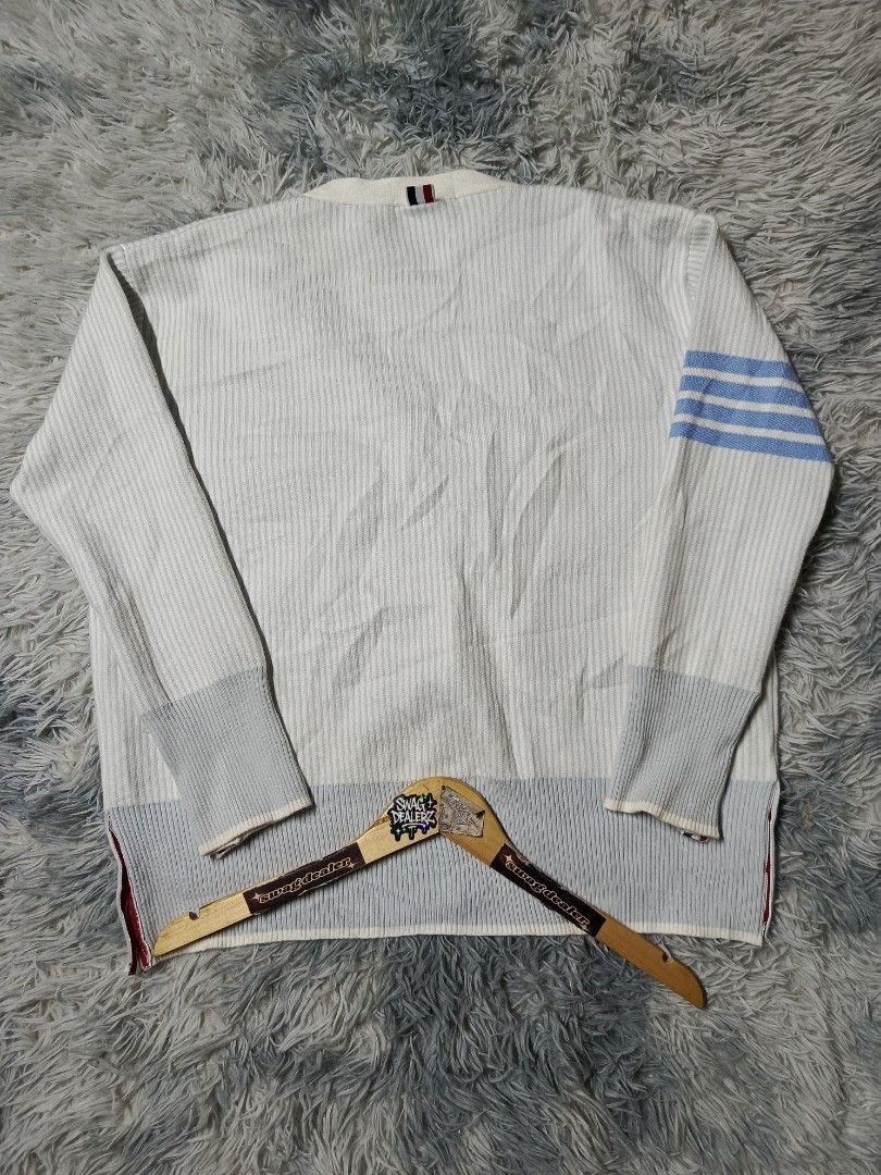 Thom Browne Pinstripe Cardigan (Category: Luxury Apparel) located in Manila. Submitted by swag_dealer (Listing ID 1448970753, Image 2). Description: Thom Browne Pinstripe Cardigan Fits M - L Length: 26 Width: 24 No wahtags Off only Need wash 800+sf.