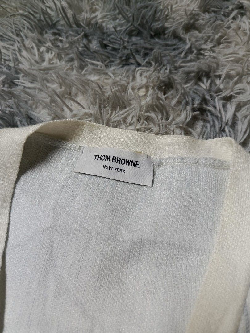 Thom Browne Pinstripe Cardigan (Category: Luxury Apparel) located in Manila. Submitted by swag_dealer (Listing ID 1448970753, Image 3). Description: Thom Browne Pinstripe Cardigan Fits M - L Length: 26 Width: 24 No wahtags Off only Need wash 800+sf.