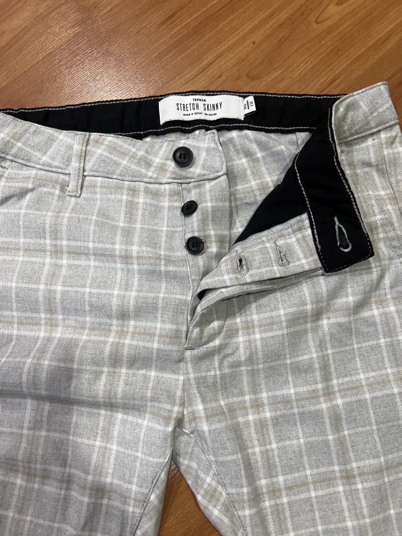 Topman Stretch Skinny Plaid Pants (Category: Trousers) located in Muntinlupa City. Submitted by emvn (Listing ID 1449065767, Image 3). Description: - Topman stretch skinny pants - Classic plaid pattern: Light grey with white and tan lines - Button fly closure for a secure fit - Comfortable and stylish for corporate/smart casual wear - Versatile: Perfect for dressing up or down .