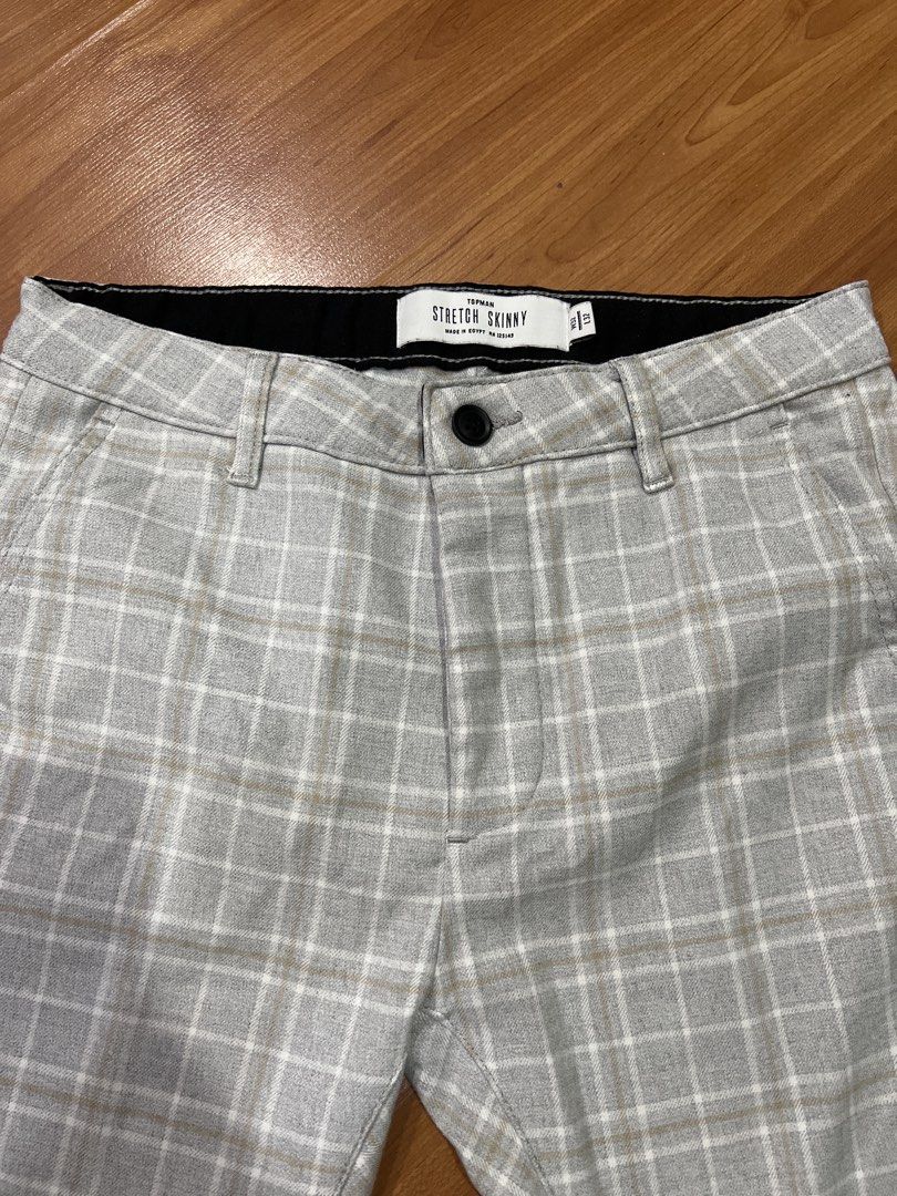 Topman Stretch Skinny Plaid Pants (Category: Trousers) located in Muntinlupa City. Submitted by emvn (Listing ID 1449065767, Image 2). Description: - Topman stretch skinny pants - Classic plaid pattern: Light grey with white and tan lines - Button fly closure for a secure fit - Comfortable and stylish for corporate/smart casual wear - Versatile: Perfect for dressing up or down .