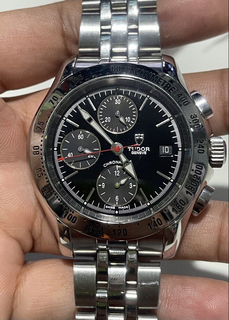 Tudor Geneve Chronograph Tachymetre (Category: Luxury Watches) located in Taguig. Submitted by j_watches007 (Listing ID 1449077005, Image 2). Description: - Tudor Geneve Chronograph Watch - Swiss Made - Black dial with silver hands and markers - Tachymetre bezel - Stainless steel bracelet - Date window at 3 o'clock - Threes subdials - 40mm “Watch Only” DISCLAIMER: IT’S OLD USED WATCHES EXPECT OF SOME SCRATCHES/SIGNS OF USAGE & PLEASE MANAGE YOUR 