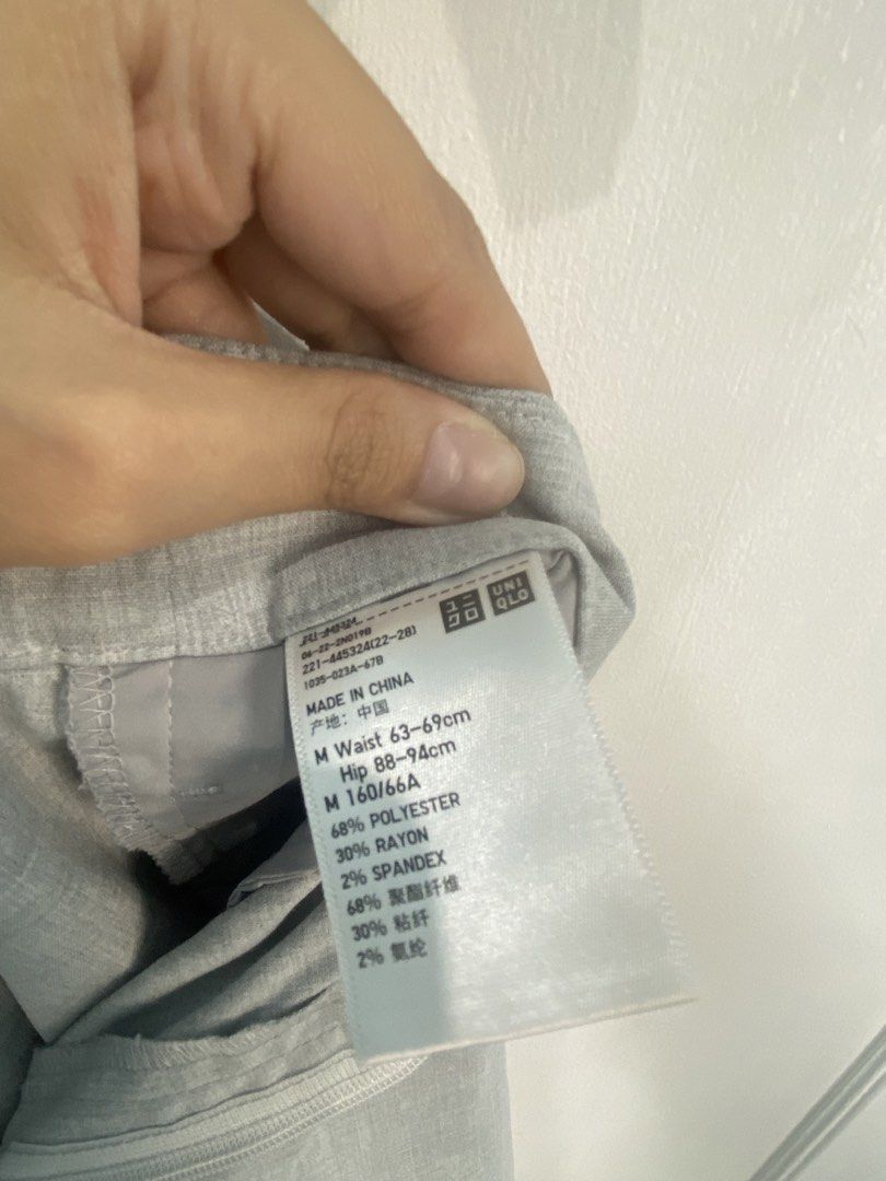 Uniqlo Gray Smart Shorts (Category: Shorts) located in Makati City. Submitted by declutterteacher (Listing ID 1448927820, Image 3). Description: - Uniqlo Grey Pleated Shorts - Material: Polyester, Rayon, Spandex blend - Closure: Zip and button - Condition: Dark stains on front left leg (please check photos) - Measurements: Waist 63-69cm, Hip 88-94cm - Fits S-M.