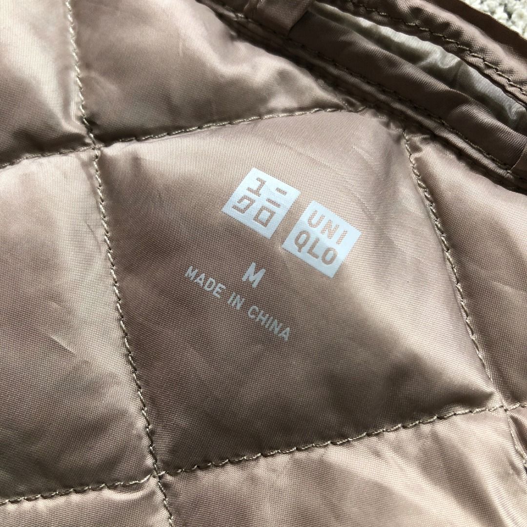 UNIQLO Ultra Light Down Quilted Jacket Collarless Bronze Size Medium (Category: Coats, Jackets and Outerwear) located in Santa Rosa. Submitted by sergids (Listing ID 1448920879, Image 2). Description: UNIQLO Ultra Light Down Quilted Jacket Collarless Bronze Size Medium Great condition. Check fitting tops to ensure this fits you. Dimensions below are exact measurements, see pics as well for comparison. 9/10 Condition and Colorway Dimensions: Check