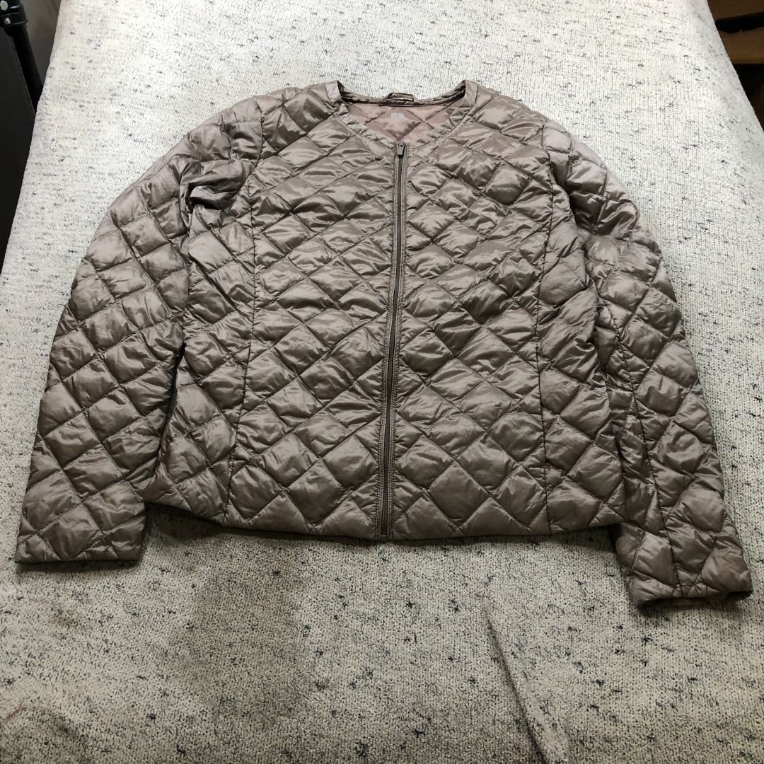 UNIQLO Ultra Light Down Quilted Jacket Collarless Bronze Size Medium (Category: Coats, Jackets and Outerwear) located in Santa Rosa. Submitted by sergids (Listing ID 1448920879, Image 3). Description: UNIQLO Ultra Light Down Quilted Jacket Collarless Bronze Size Medium Great condition. Check fitting tops to ensure this fits you. Dimensions below are exact measurements, see pics as well for comparison. 9/10 Condition and Colorway Dimensions: Check