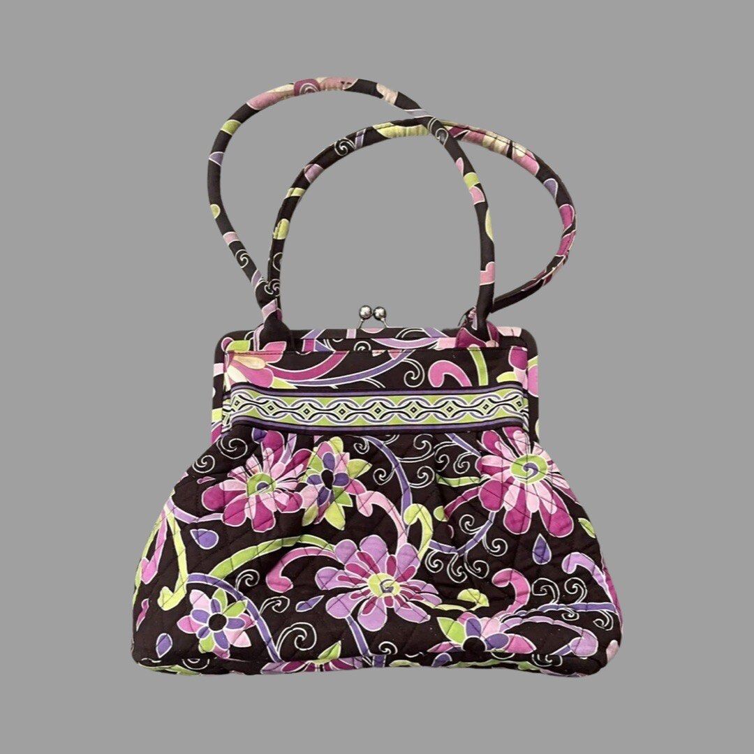 Vera Bradley Quilted Floral Purse (Category: Purses & Pouches) located in Las Pinas. Submitted by hannadeulsett (Listing ID 1448966652, Image 1). Description: Authentic, vintage Vera Bradley “Alice” handbag in the collectible Purple Punch floral pattern. Features a beautiful, sturdy silver kiss-lock frame closure that works perfectly. Condition: Pre-loved. Please note there is some visible fraying and light fading along the fabric piping/edges (s