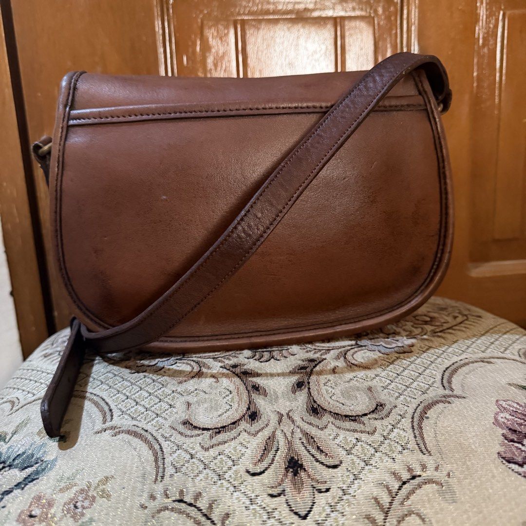 Vintage Coach Prairie 9954 authentic (Category: Cross-body Bags) located in Bulacan. Submitted by comkay (Listing ID 1448997139, Image 3). Description: Vintage Coach Prairie 9954 My personal favorite vintage bag from Coach - Stamped creeds reads Made in US August 1996 - Gloved tanned leather material - Brass hardware - Has been well used a little dry can do some conditioning - Not sure about the color as it seeks to have been recolored but has a 