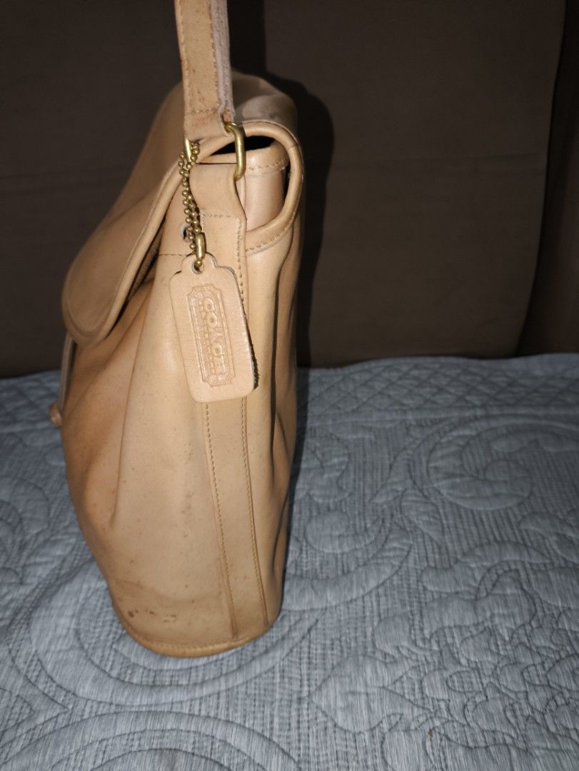VINTAGE COACH Shoulder Pouch Style 4025 (Category: Shoulder Bags) located in San Jose. Submitted by nnayramsfinds (Listing ID 1448946686, Image 3). Description: - with hangtag -see photos for the condition, this is an 80s bag. -already cleaned, mold treated and reconditioned with leather CPR -bought this jere in Carousell, rfs: I got waaay more bags and need to let go of a few pieces. -SF is 100..