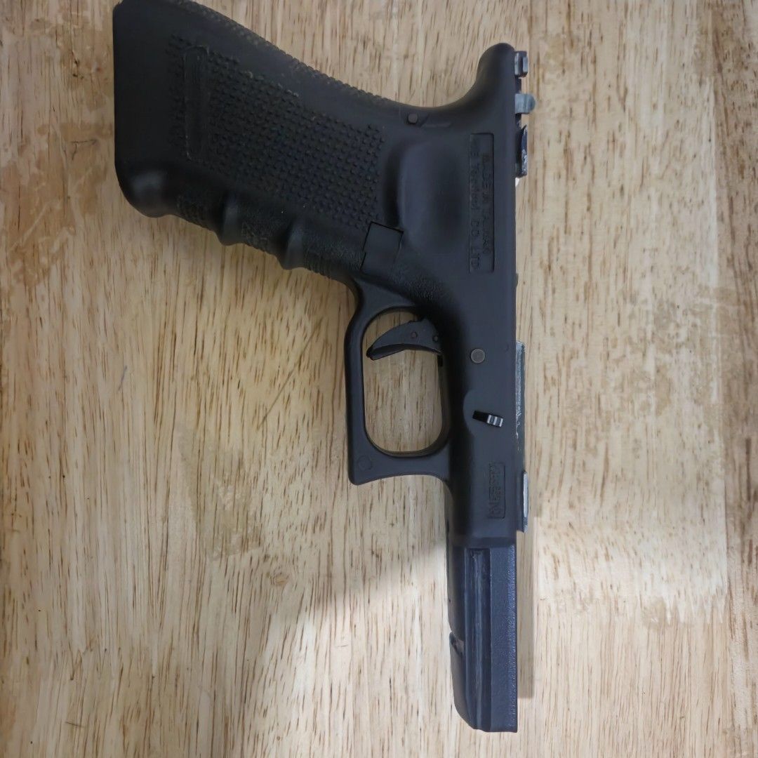 WE g18c airsoft (Category: Action & Battle Toys) located in Mandaluyong City. Submitted by lauracmendoza (Listing ID 1448945993, Image 3). Description: issues: inner barrel has a small chip, all the parts inside the blowback housing are broken (slide doesnt function), missing selector lever the frame is fine except for the hammer assembly at the back which is broken and doesnt work, and missing slide release spring selling for parts or as a prop.