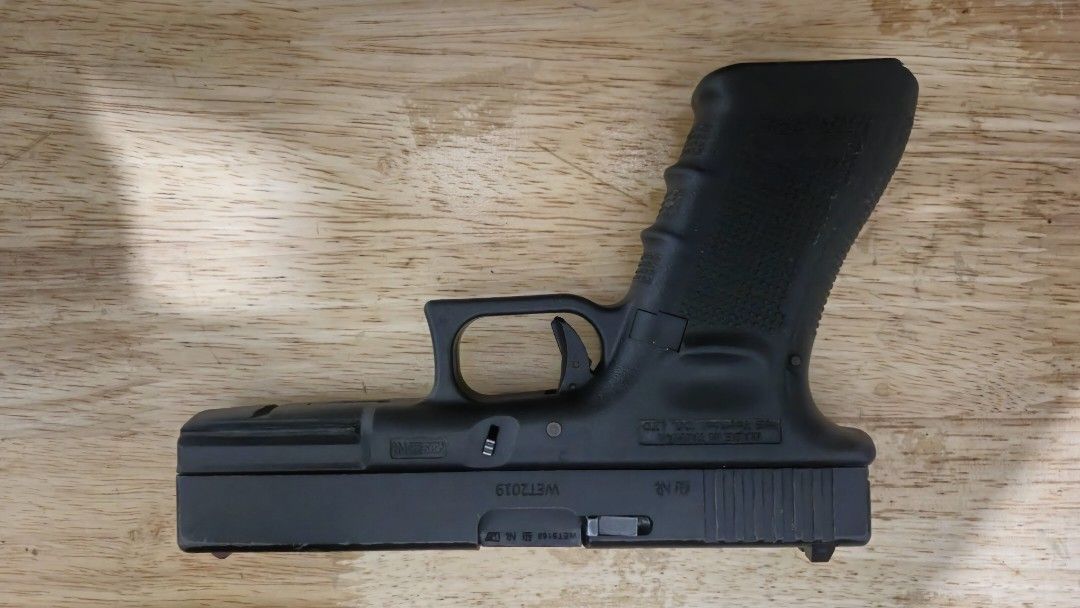 WE g18c airsoft (Category: Action & Battle Toys) located in Mandaluyong City. Submitted by lauracmendoza (Listing ID 1448945993, Image 1). Description: issues: inner barrel has a small chip, all the parts inside the blowback housing are broken (slide doesnt function), missing selector lever the frame is fine except for the hammer assembly at the back which is broken and doesnt work, and missing slide release spring selling for parts or as a prop.