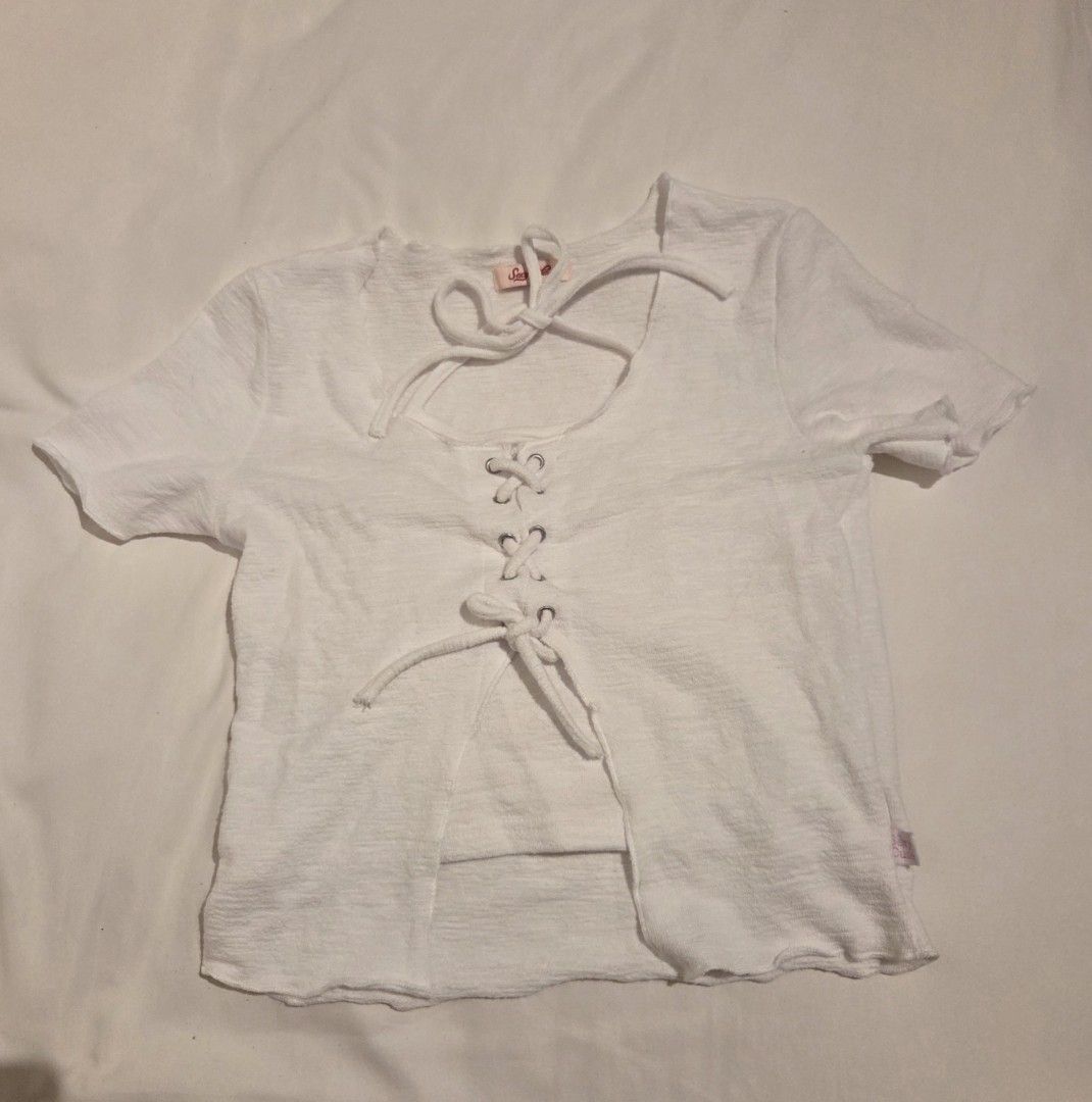White cute shirt S-M (Category: Shirts) located in Makati City. Submitted by mandy.stuff (Listing ID 1449038213, Image 1). Description: Small to medium Length: 43 cm / 17 in.