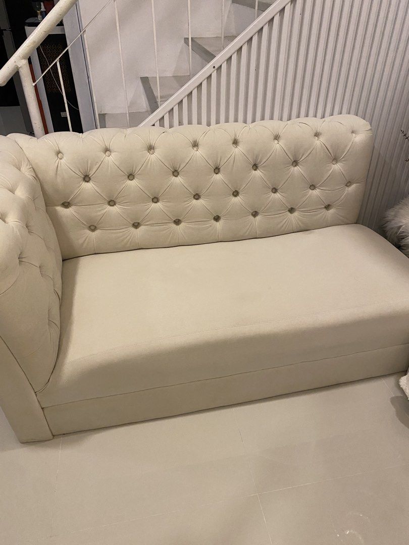 White Tufted Sofa with Plush Throws and Cushions (Category: Sofas) located in Manila. Submitted by happydogseller (Listing ID 1448972979, Image 3). Description: - White tufted sofa - Looks very comfy - Includes several plush throws and decorative cushions - Ideal for living room or as a daybed - Tufting adds a nice detail - Plenty of space to relax.