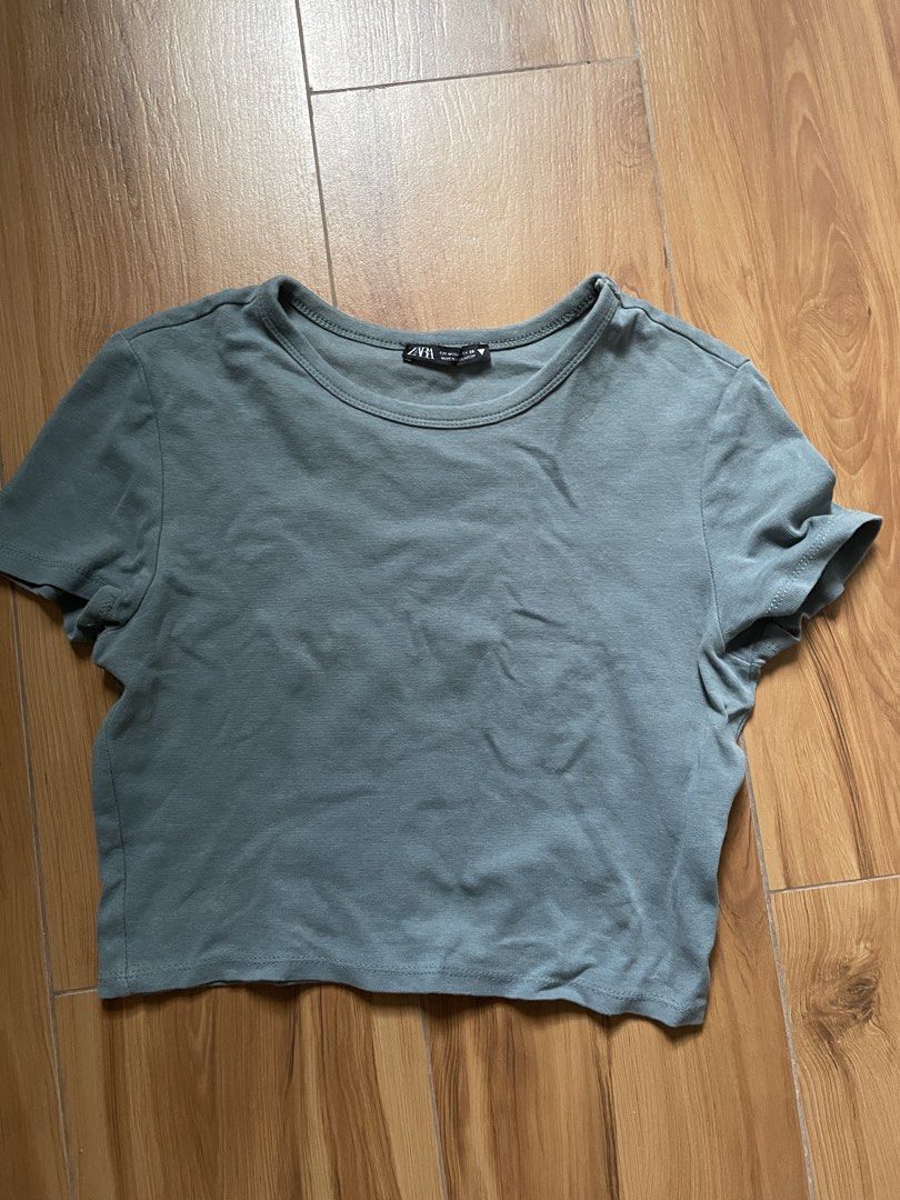 Zara Basic Cropped T-Shirt (Category: Shirts) located in Quezon City. Submitted by declutter._.closet (Listing ID 1449008887, Image 1). Description: - Zara basic cropped t-shirt - Short sleeves - Crew neck - Simple and versatile - Easy to style for casual wear.