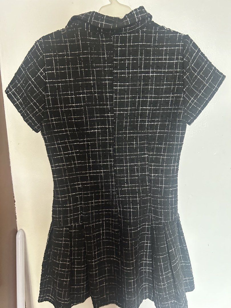 ZARA Black White Tweed Button Up Mini Dress (Category: Dresses) located in Quezon City. Submitted by twinklestyle (Listing ID 1448921444, Image 2). Description: - Zara black and white tweed mini dress - Size: Medium (M) - Features: Collared neckline, short sleeves, button-up front - Skirt: Flared with pleats - Pockets: Functional side pockets - Style: Perfect for dressing up or down.