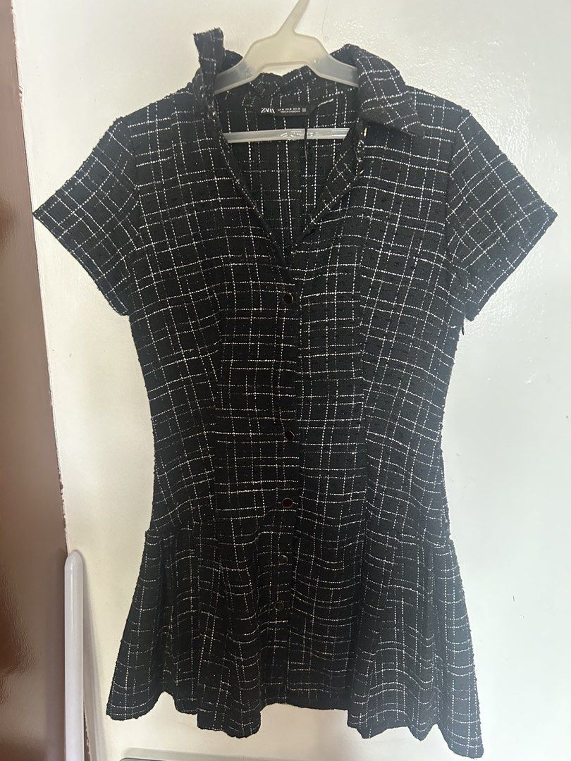 ZARA Black White Tweed Button Up Mini Dress (Category: Dresses) located in Quezon City. Submitted by twinklestyle (Listing ID 1448921444, Image 3). Description: - Zara black and white tweed mini dress - Size: Medium (M) - Features: Collared neckline, short sleeves, button-up front - Skirt: Flared with pleats - Pockets: Functional side pockets - Style: Perfect for dressing up or down.
