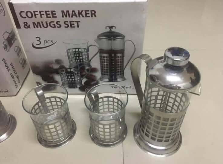 3 Pcs Coffee Maker & Mugs Set (Category: Coffee & Tea Tableware) located in Caloocan City. Submitted by shiela131538193 (Listing ID 1449252474, Image 1). Description: - Complete 3-piece coffee set - Includes 1 French press style coffee maker - Comes with 2 glass mugs with stylish metal holders - Mug capacity: 150-200 ml - Ideal for brewing your perfect morning coffee - Original box included.