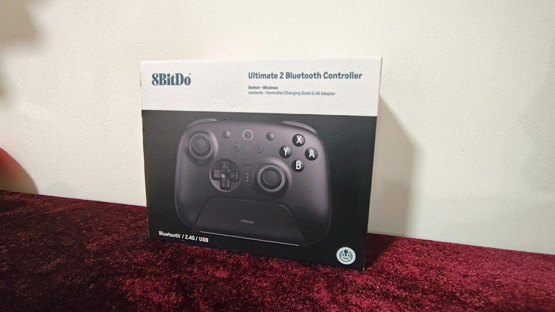 8BitDo Ultimate II Controller (Category: Controllers) located in Singapore. Submitted by aavor.2123e6 (Listing ID 1449266173, Image 1). Description: - 8BitDo Ultimate 2 - Bluetooth Controller - Colour: Black - Includes original charging dock - Comes in original box with instructions -Dusty and has small dents on right joystick, placing a thumbstick cover can cover it -No wires included -Tested all inputs Wired via Steam.